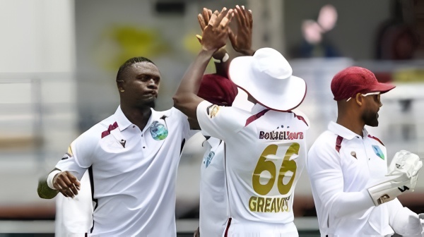 "Australia vs West Indies 2025 match action scene with batsman hitting six"